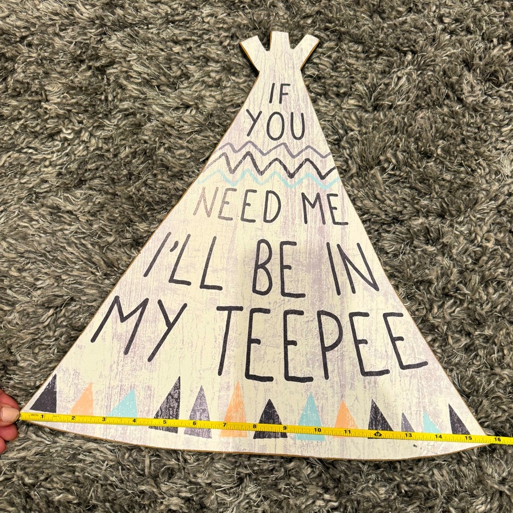 Tee pee wall sign